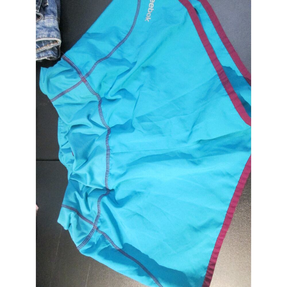 JRs SZ S Reebok turquoise shorts purple edge